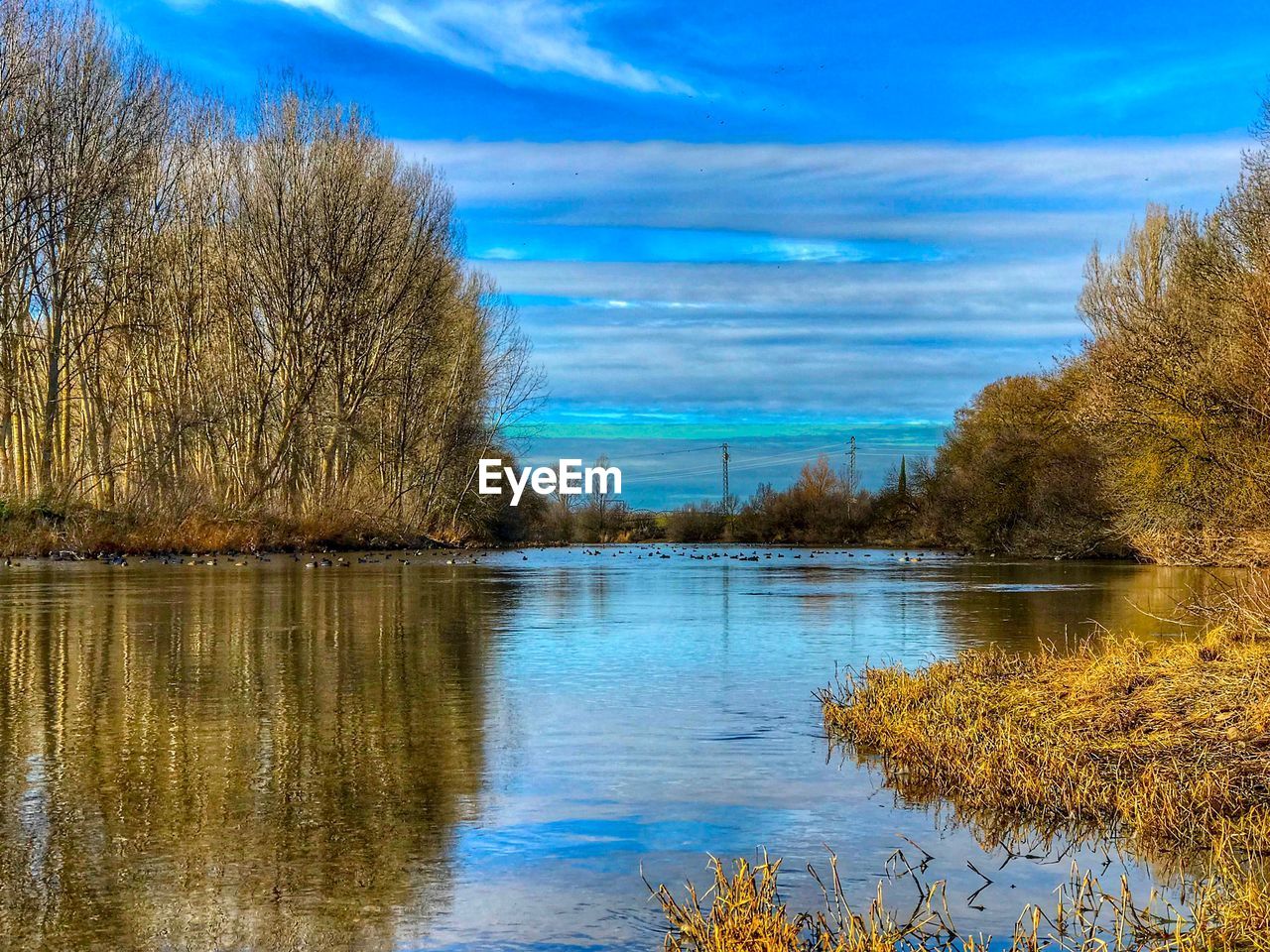 VIEW OF LAKE AGAINST SKY