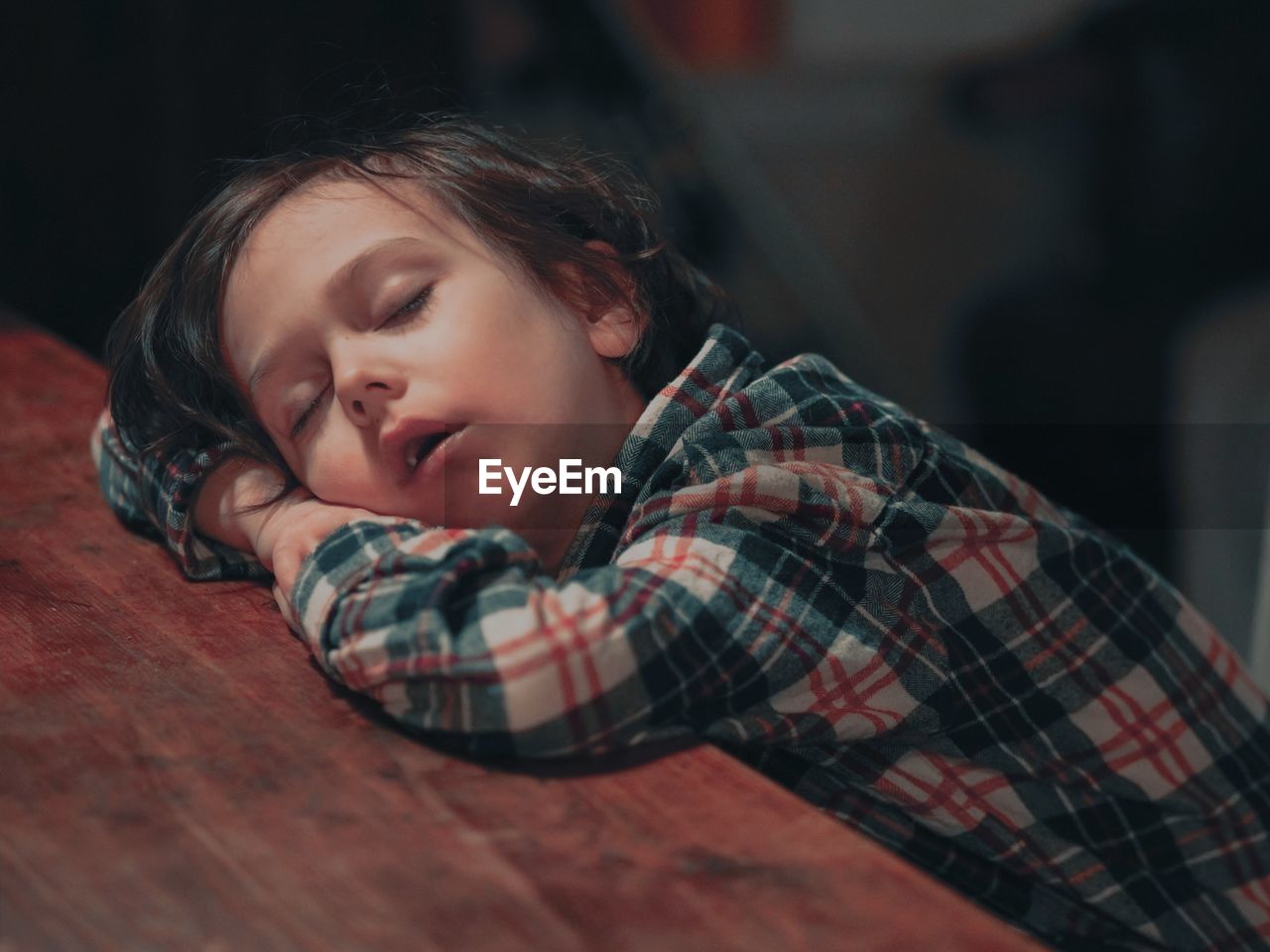 Portrait of boy sleeping at home