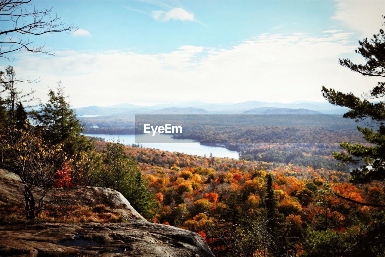 Scenic view of landscape against sky during autumn