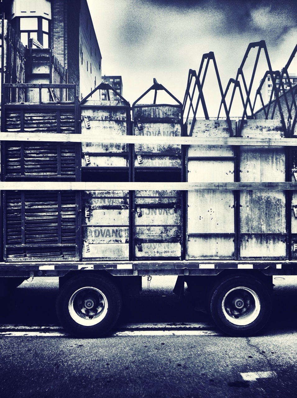 Close-up of containers on truck
