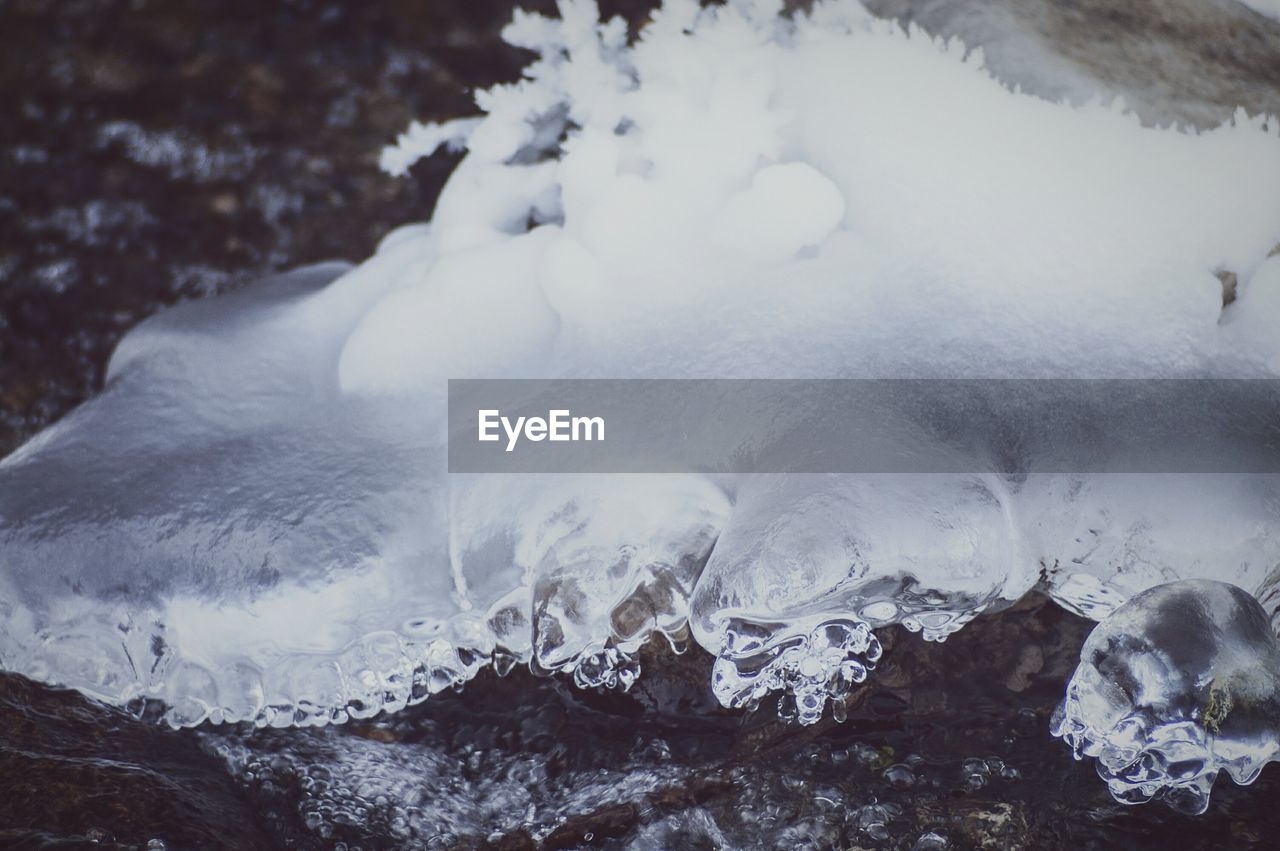 Close-up of frozen ice in river during winter