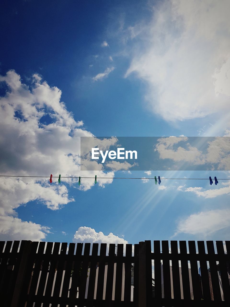 Low angle view of vapor trails in sky