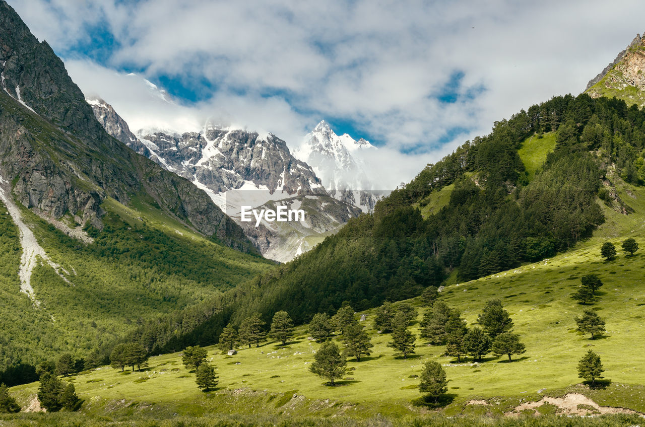 Scenic view of mountains against sky