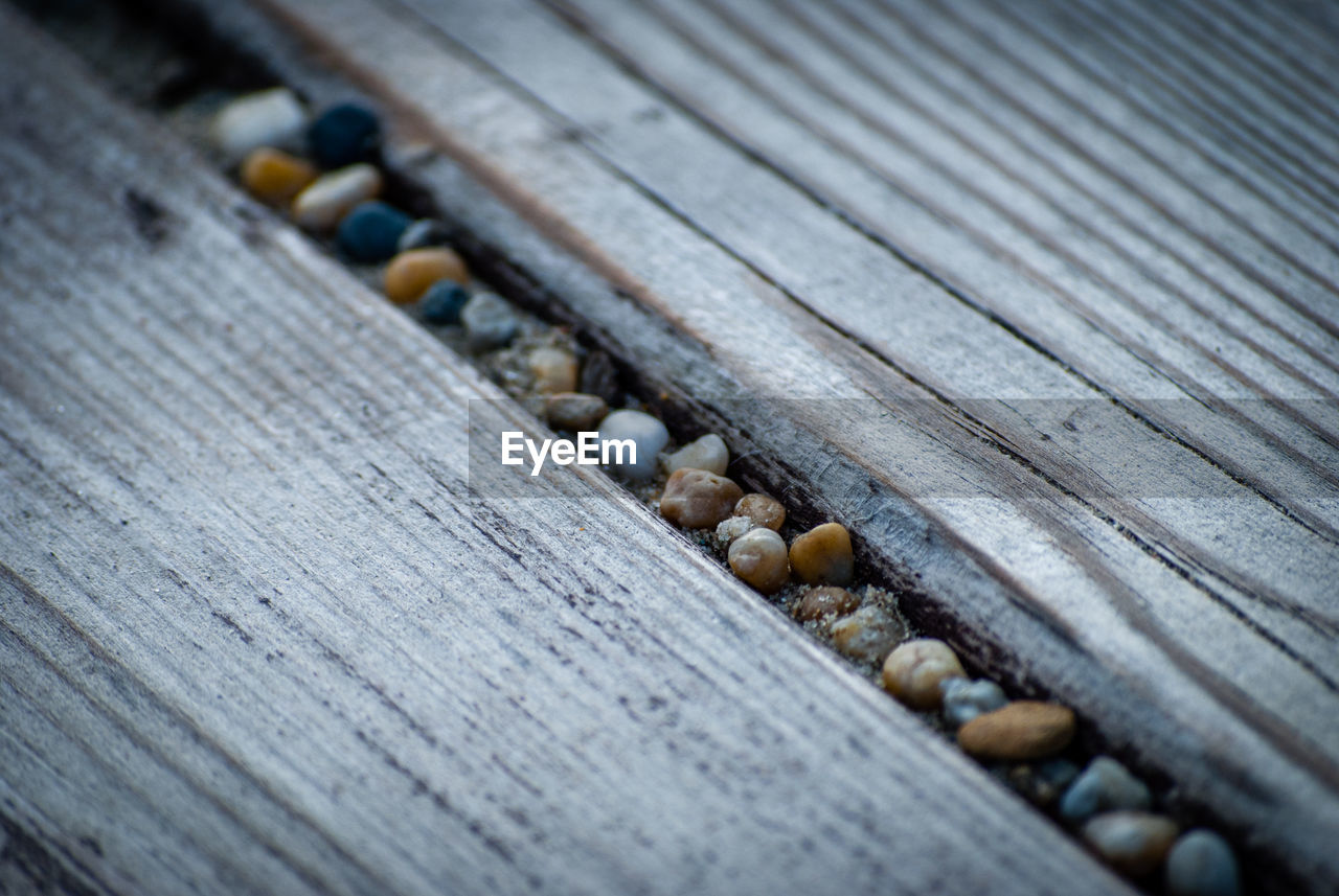 Close-up of wood and gravel