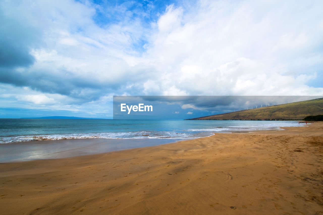 Scenic view of beach against sky