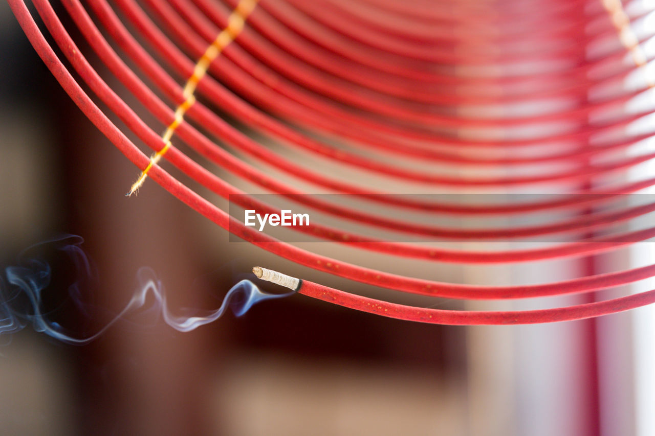 Close-up of spiral incense burning