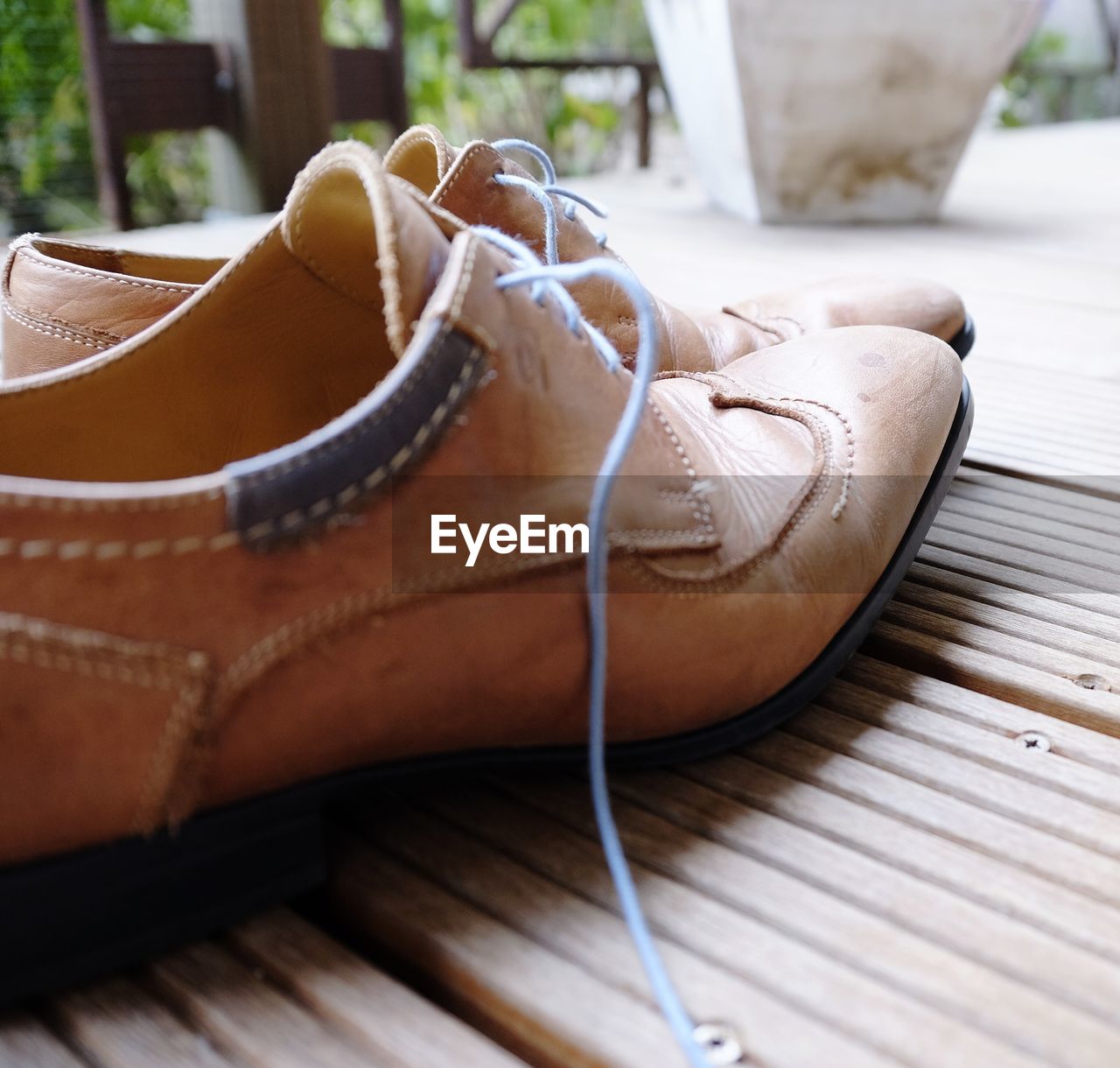 Close-up of shoes on table