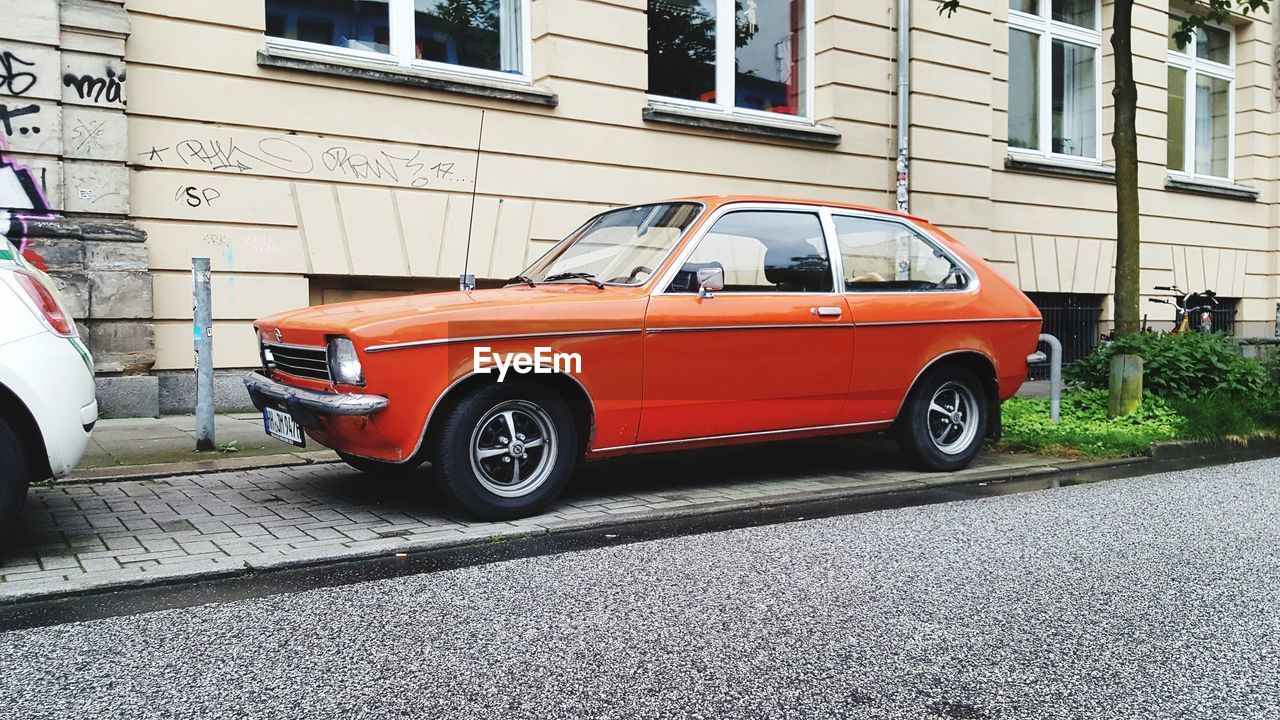 VINTAGE CAR ON ROAD