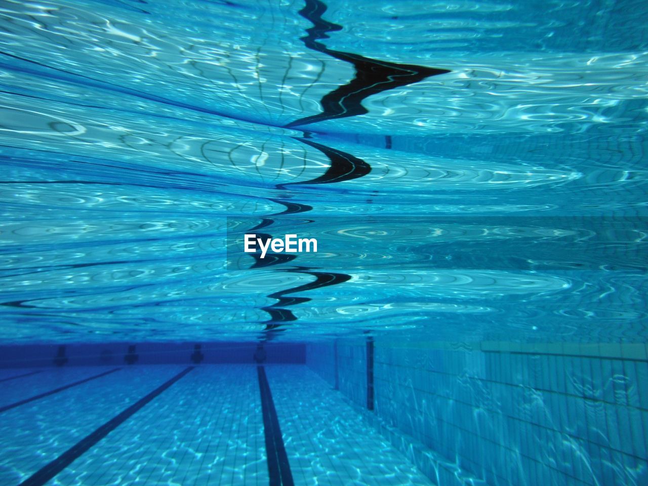 Full frame shot of blue water in swimming pool