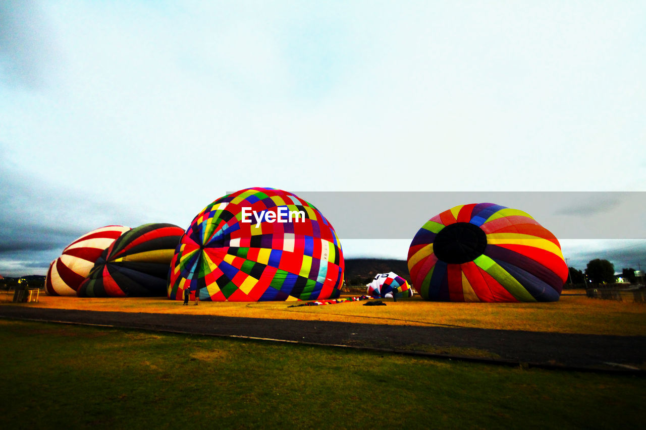 MULTI COLORED TENT ON FIELD