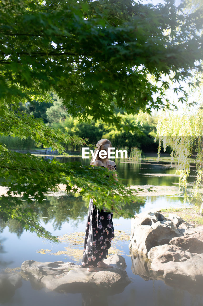 VIEW OF A DOG ON LAKE