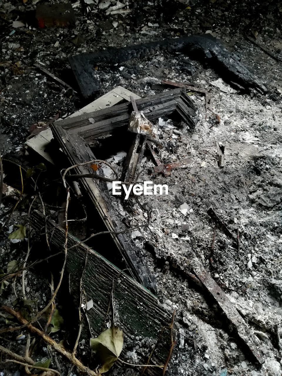 HIGH ANGLE VIEW OF BROKEN WOODEN STRUCTURE