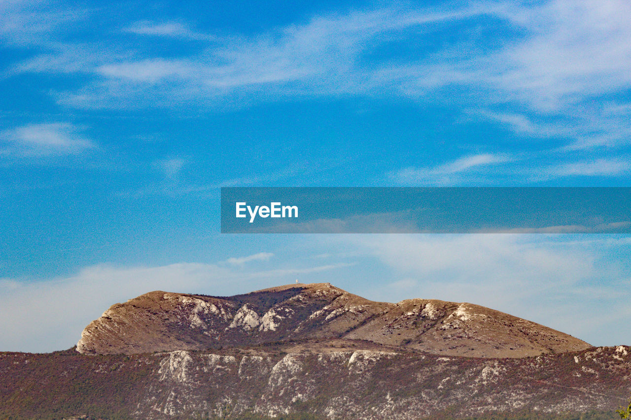 View of mountain against cloudy sky