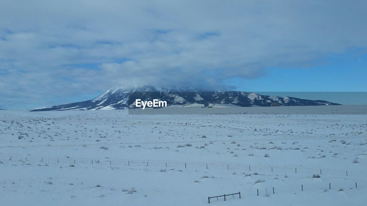 SCENIC VIEW OF MOUNTAIN AGAINST SKY