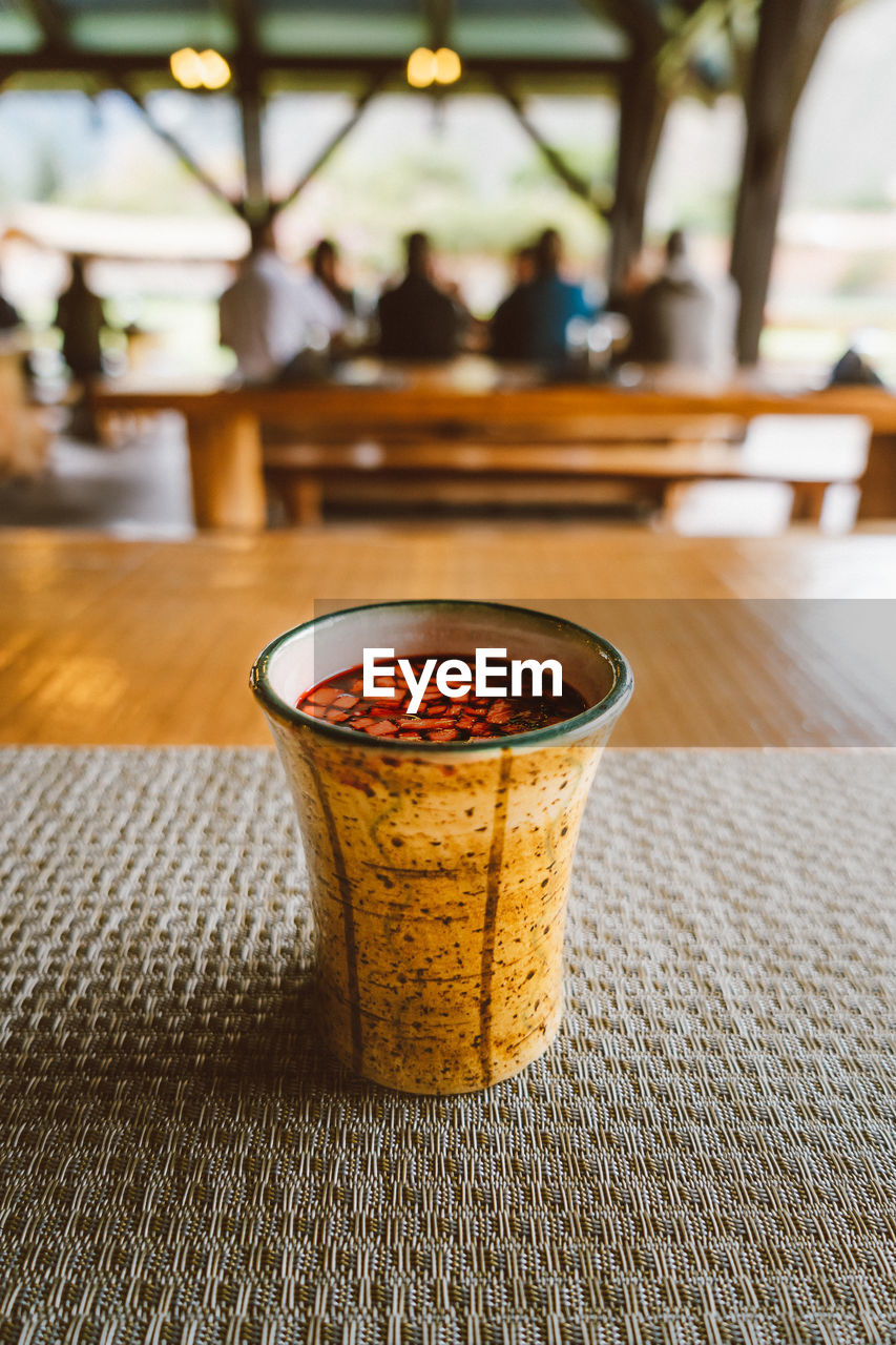 Close-up of drink served on table