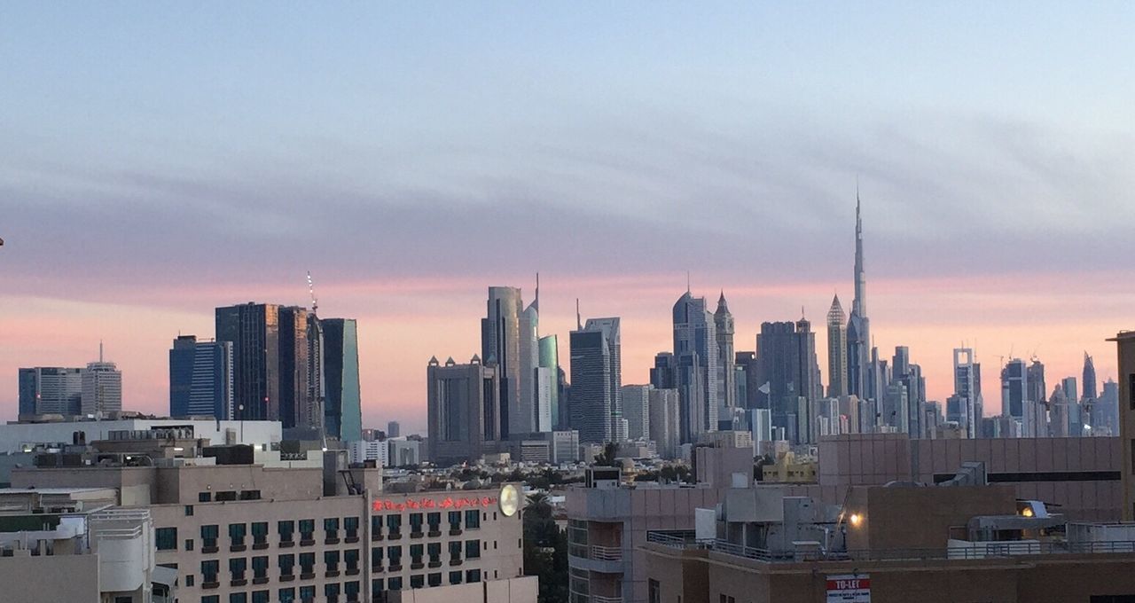 View of cityscape against sky during sunset