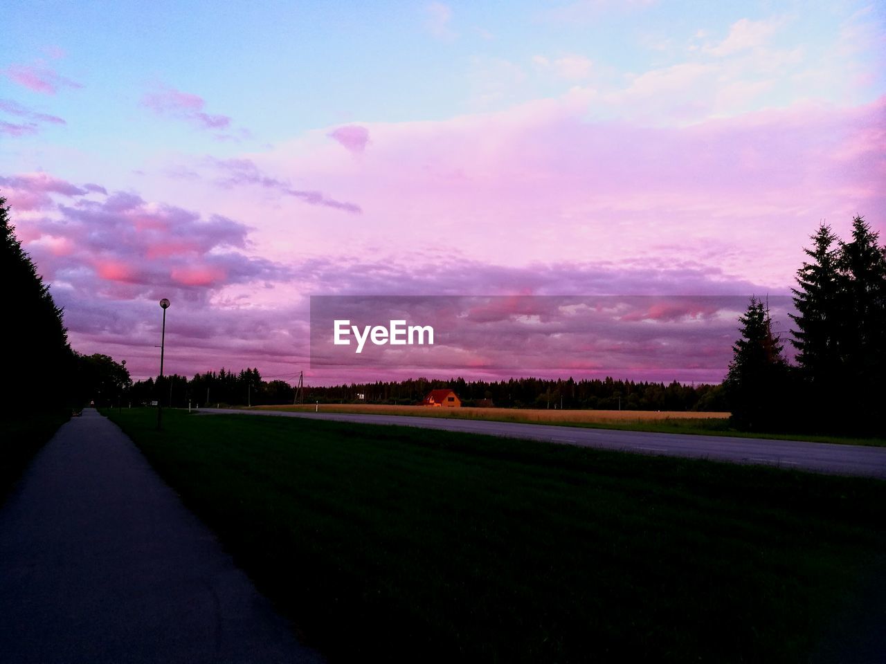 Empty road against sky