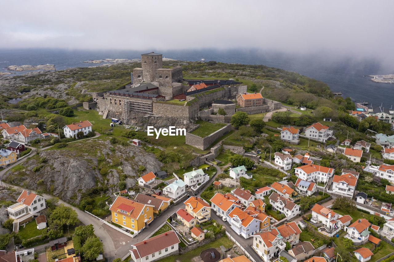 Sweden, vastra gotaland county, marstrand, aerial view of carlsten fortress and surrounding houses