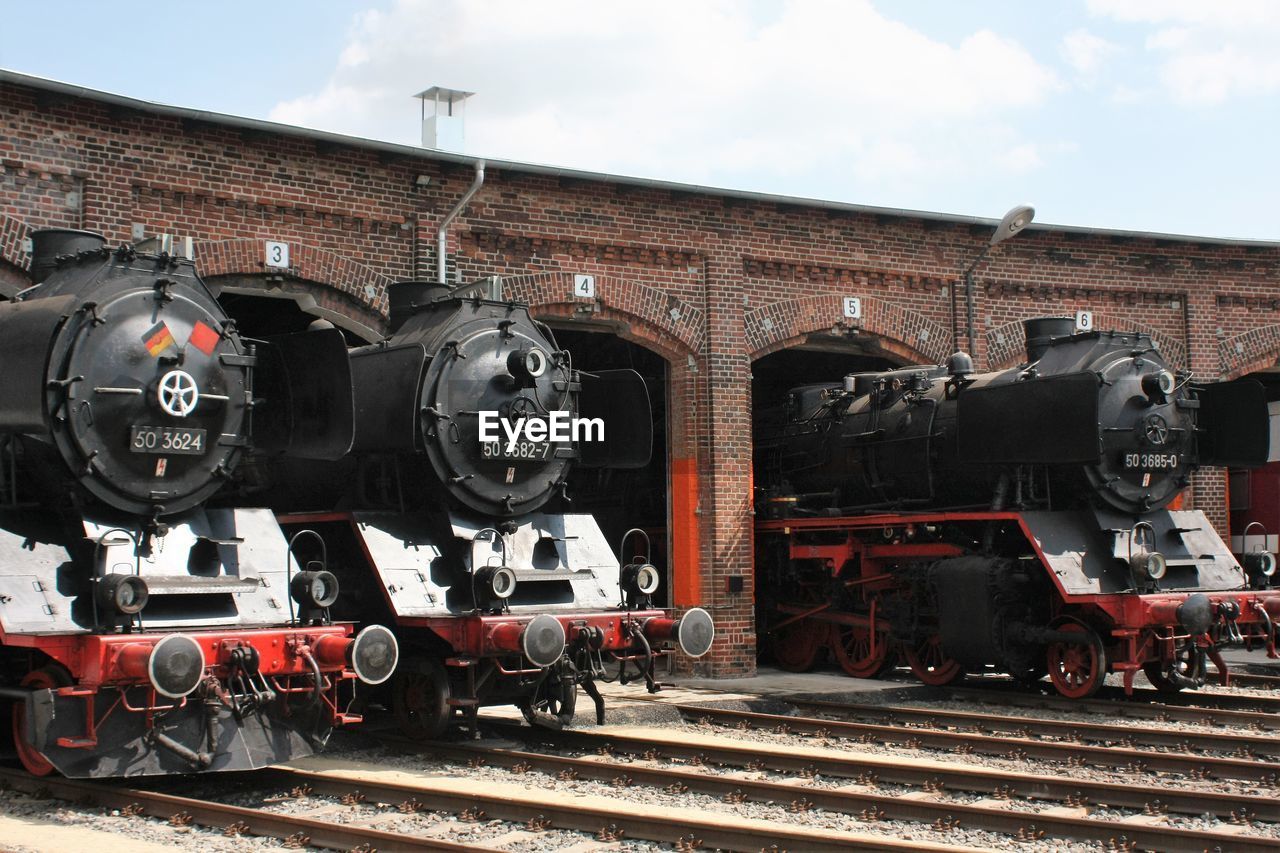 Steam engine trains against the sky