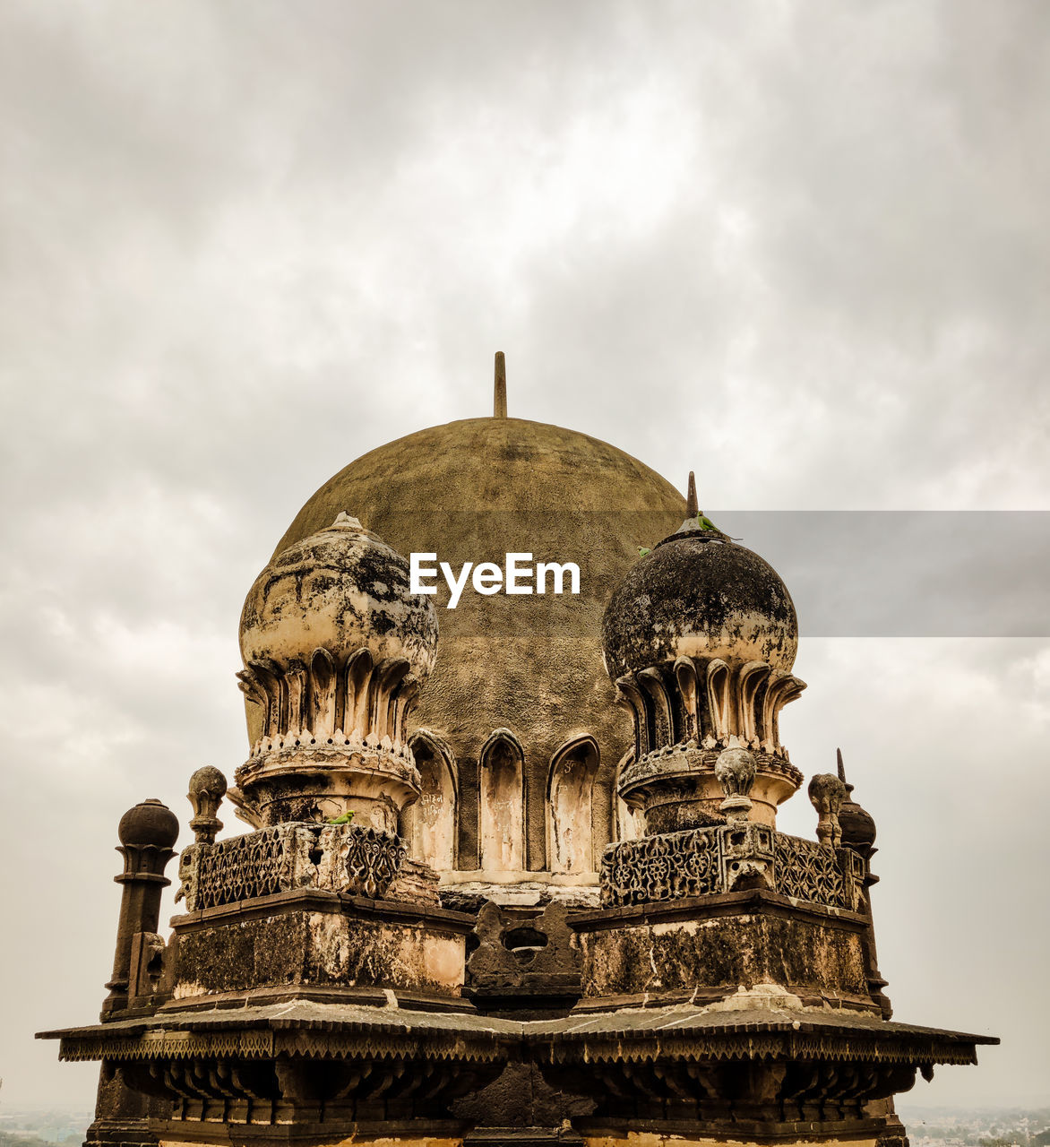 architecture, religion, built structure, travel destinations, belief, landmark, sky, building exterior, travel, temple, dome, cloud, building, history, the past, spirituality, nature, tourism, temple - building, ancient history, place of worship, city, ancient, no people, outdoors, tower