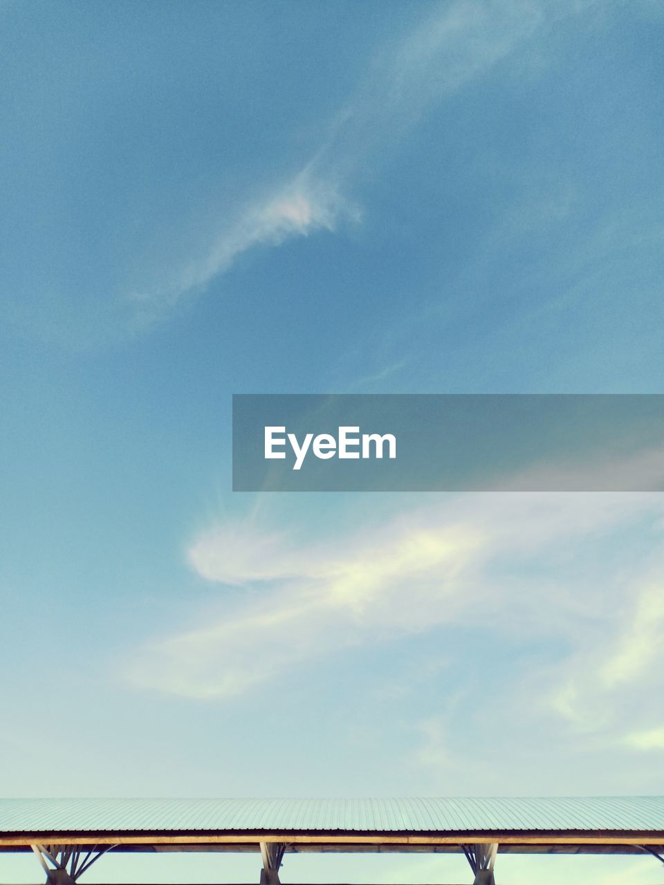 LOW ANGLE VIEW OF ROOF AGAINST SKY