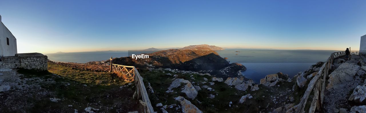 Panoramic view of sea against sky during sunset