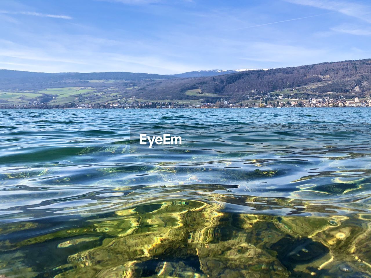 Scenic view of sea against blue sky