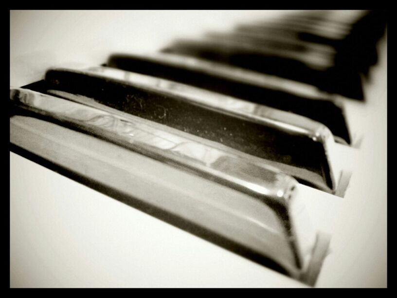 Close-up of piano keyboards