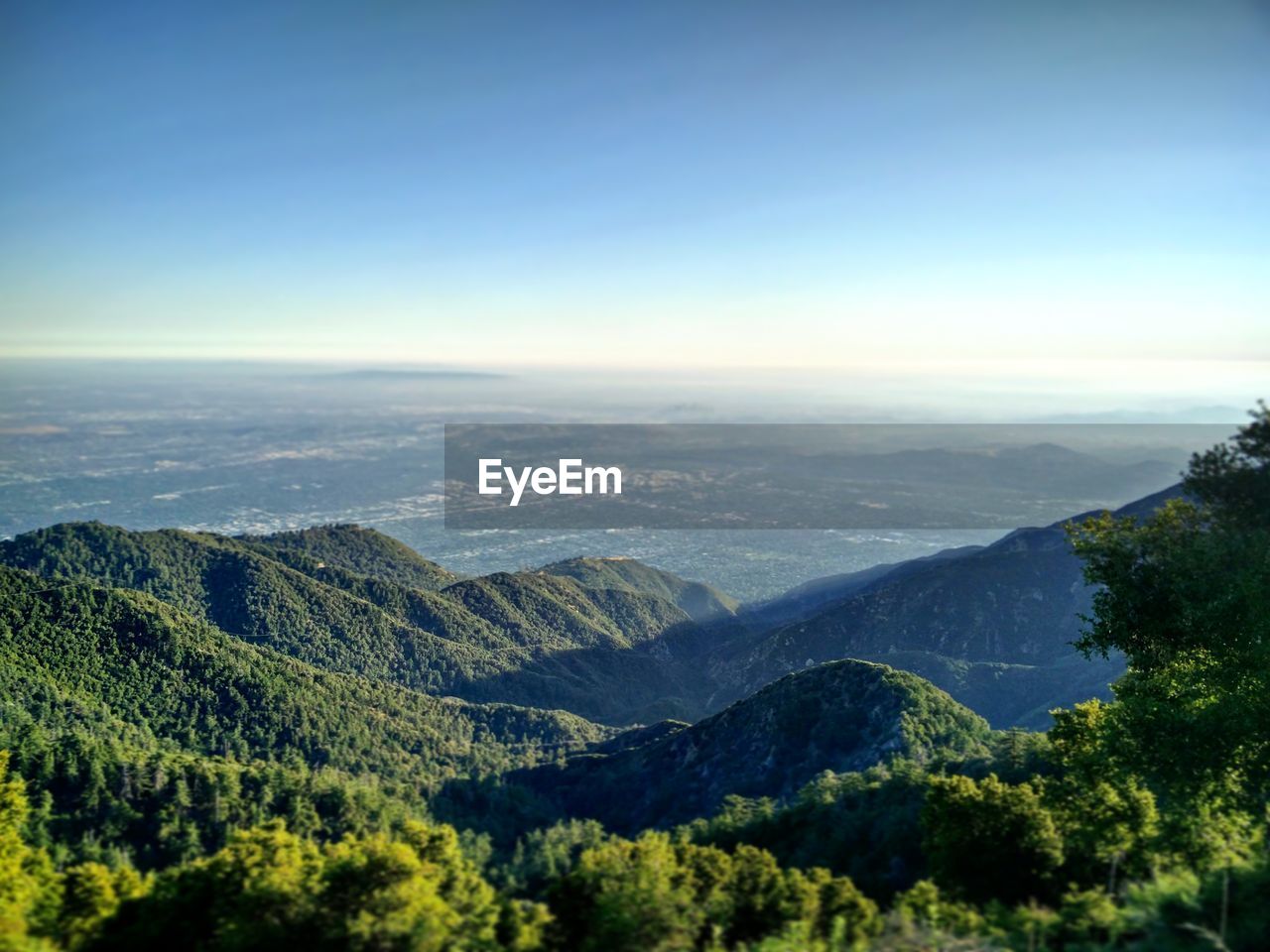 Scenic view of mountains against clear sky