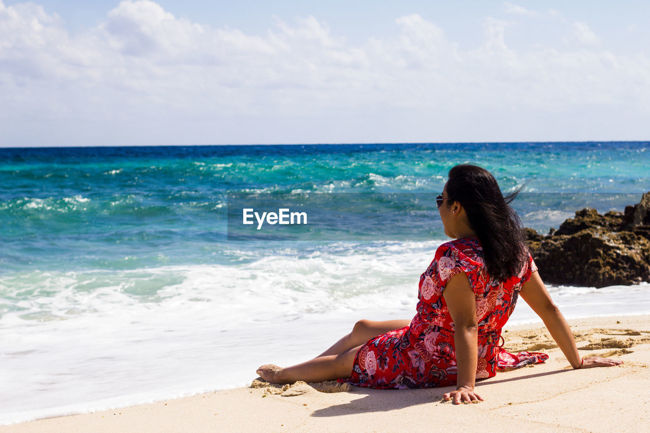 Woman relaxing at beach