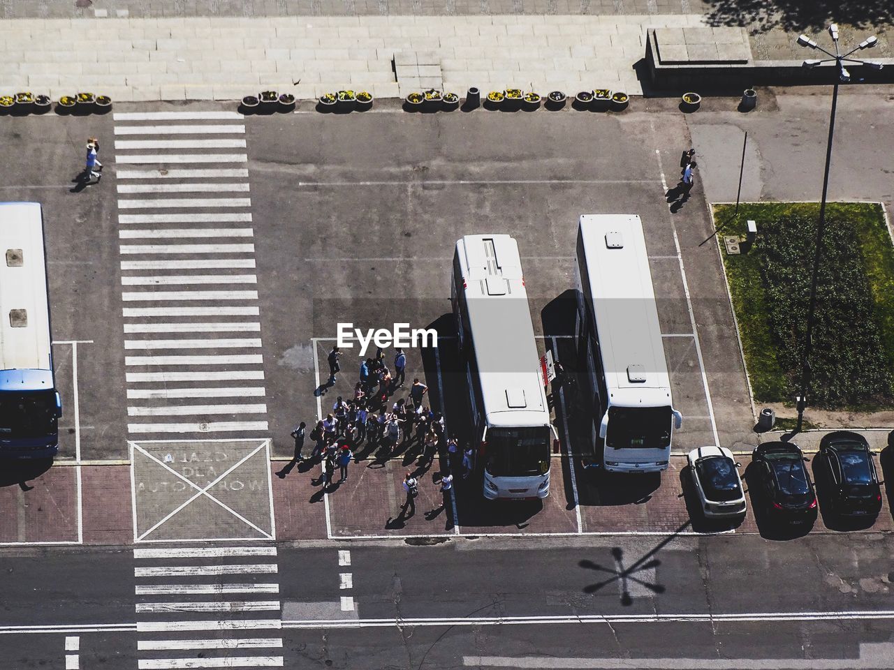 High angle view of people and buses on street s