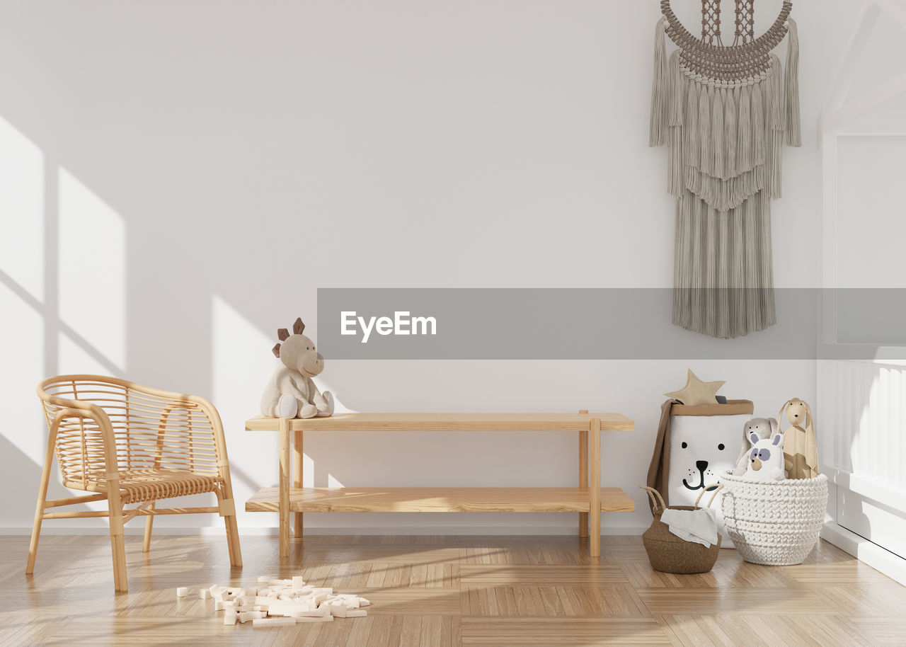 Empty white wall in modern child room. mock up interior in scandinavian, boho style. copy space 