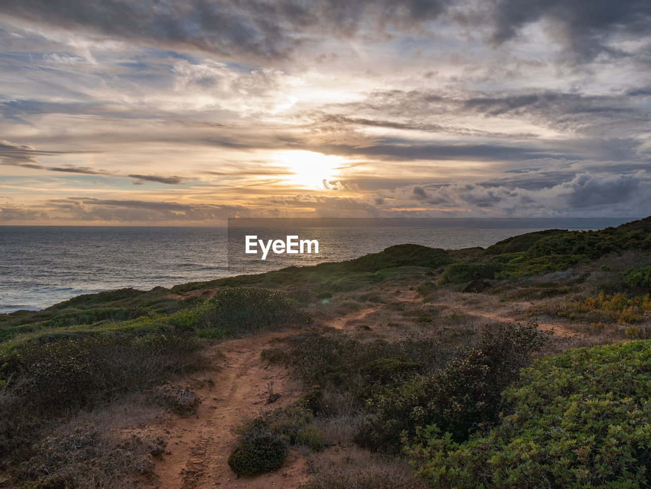 Scenic view of sea against sky during sunset