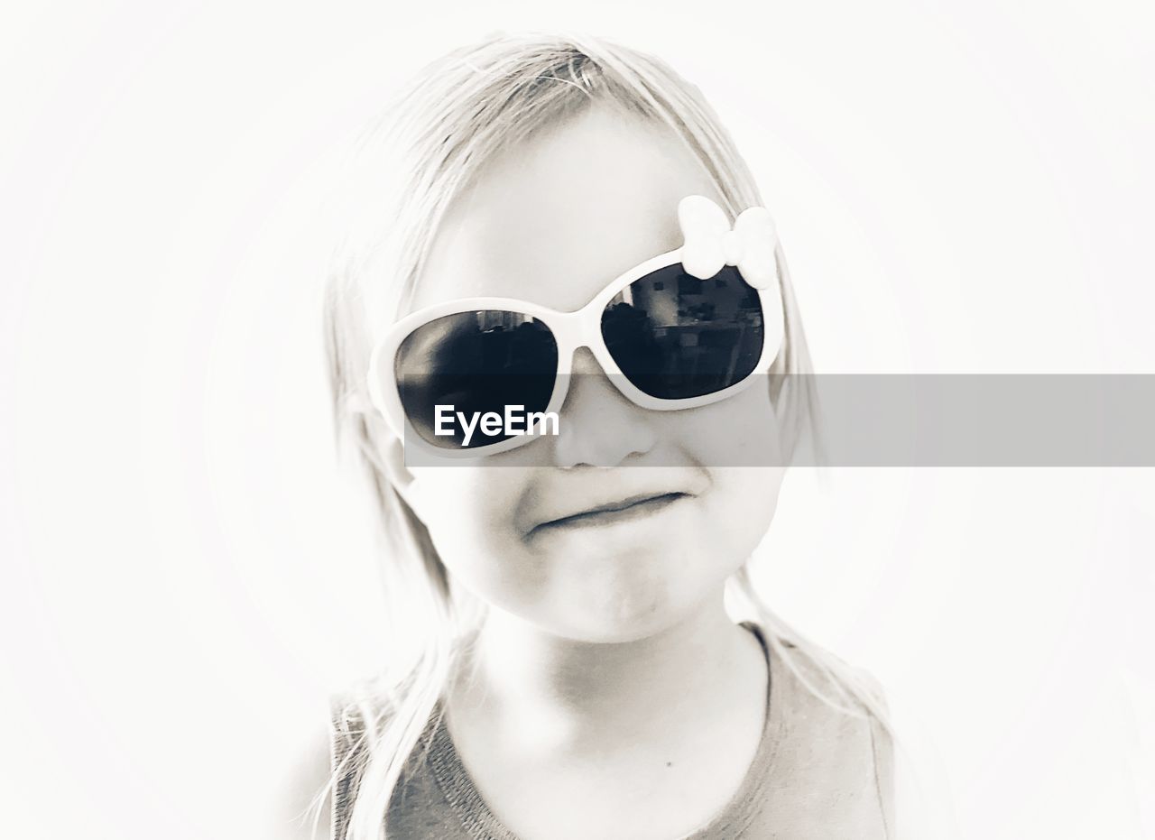 PORTRAIT OF GIRL WEARING SUNGLASSES