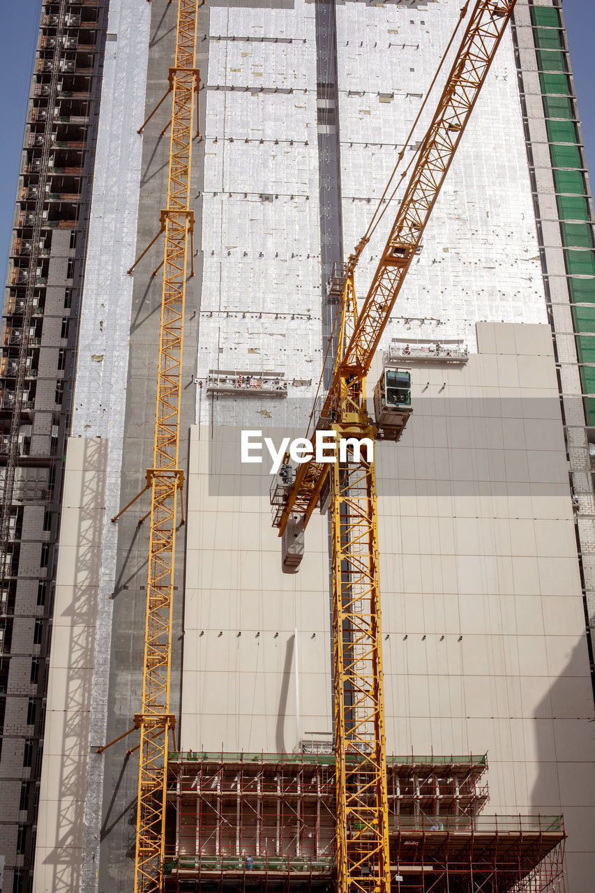 The construction of high-rise buildings in dubai. close-up