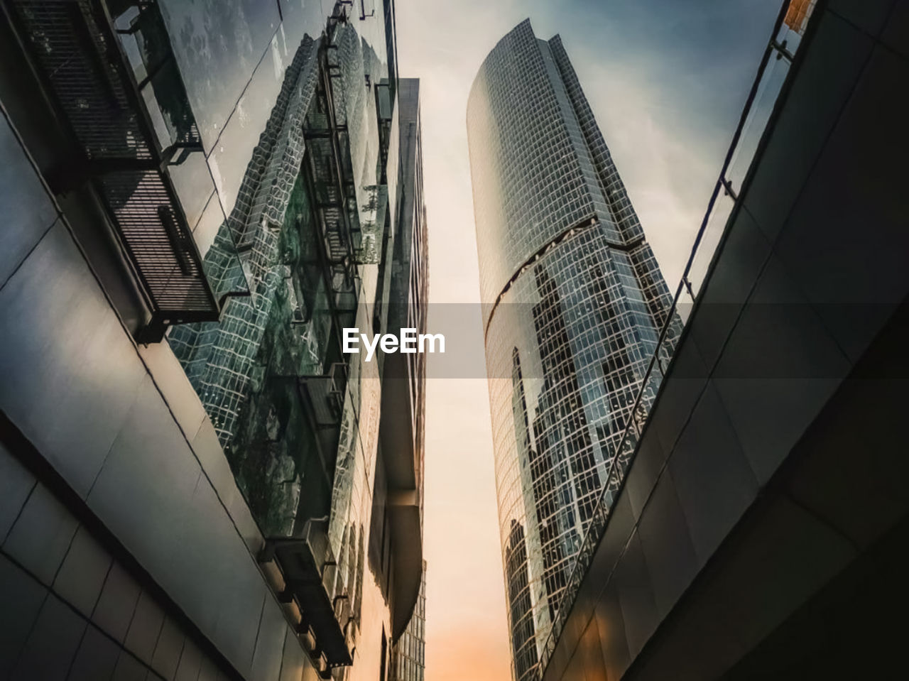 Low angle view of modern buildings against sky