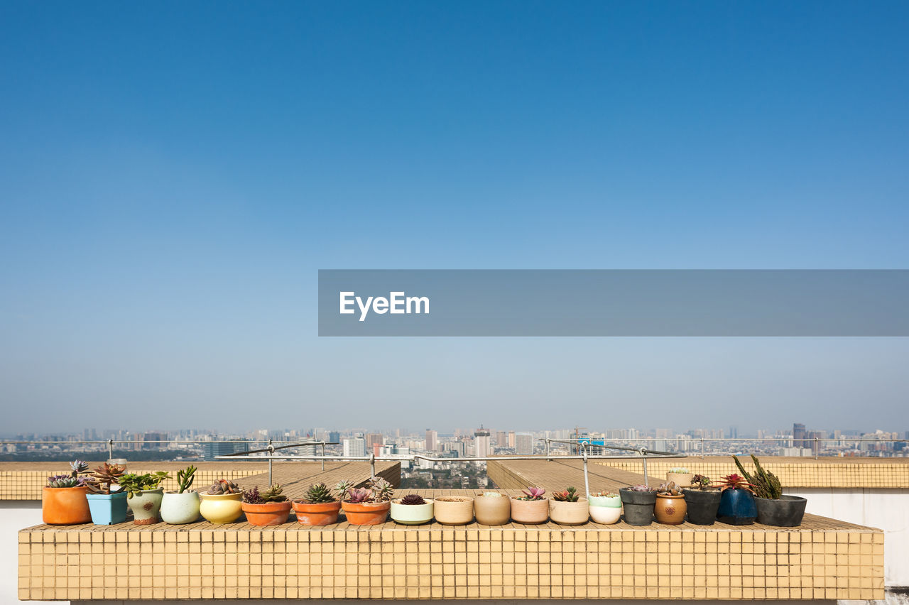 buildings in city against clear sky