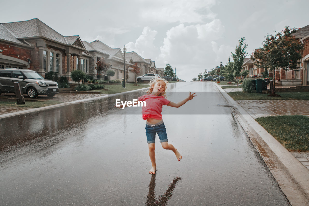 FULL LENGTH OF CHILD ON RAINY SEASON