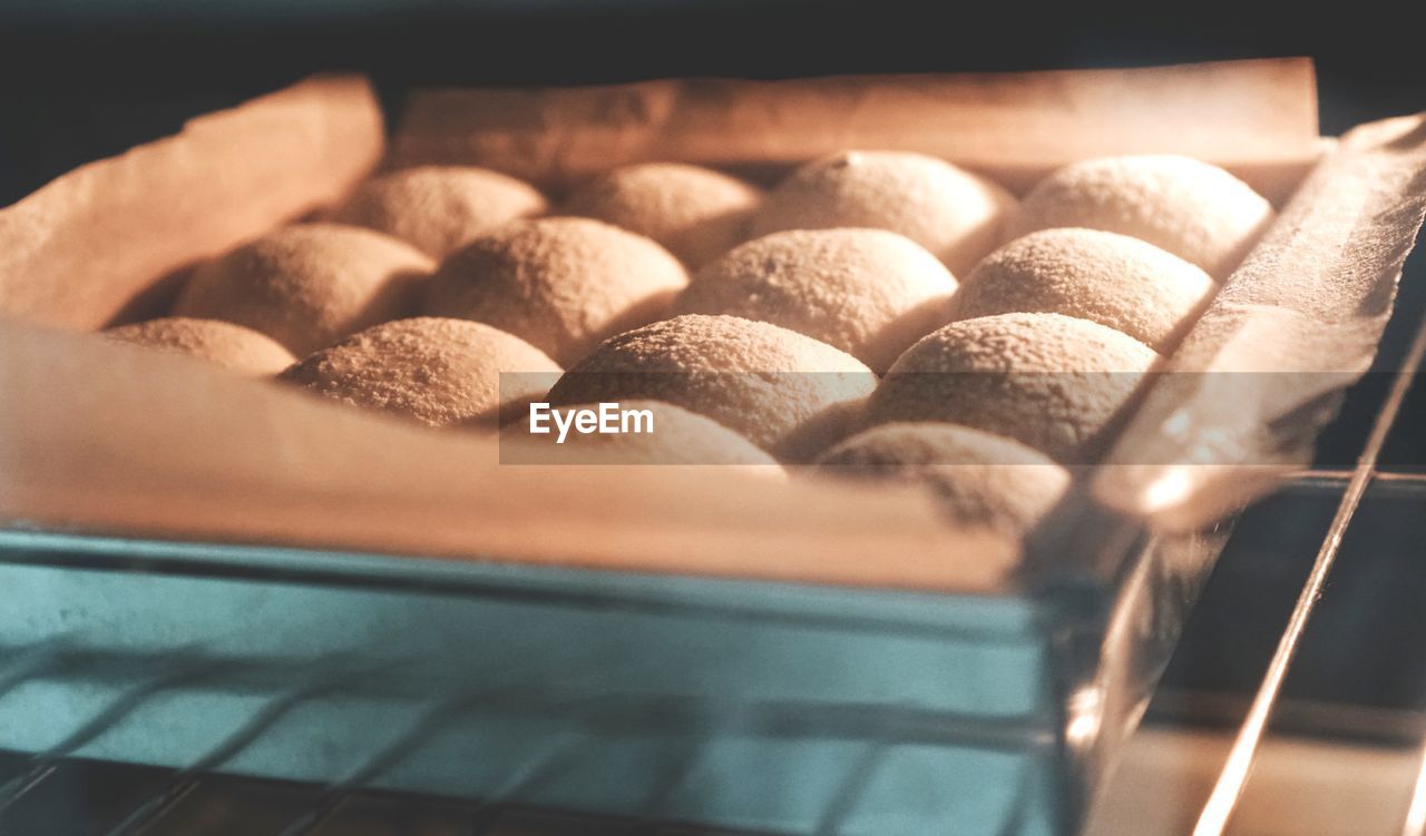 Close-up of baking pull apart bread in oven