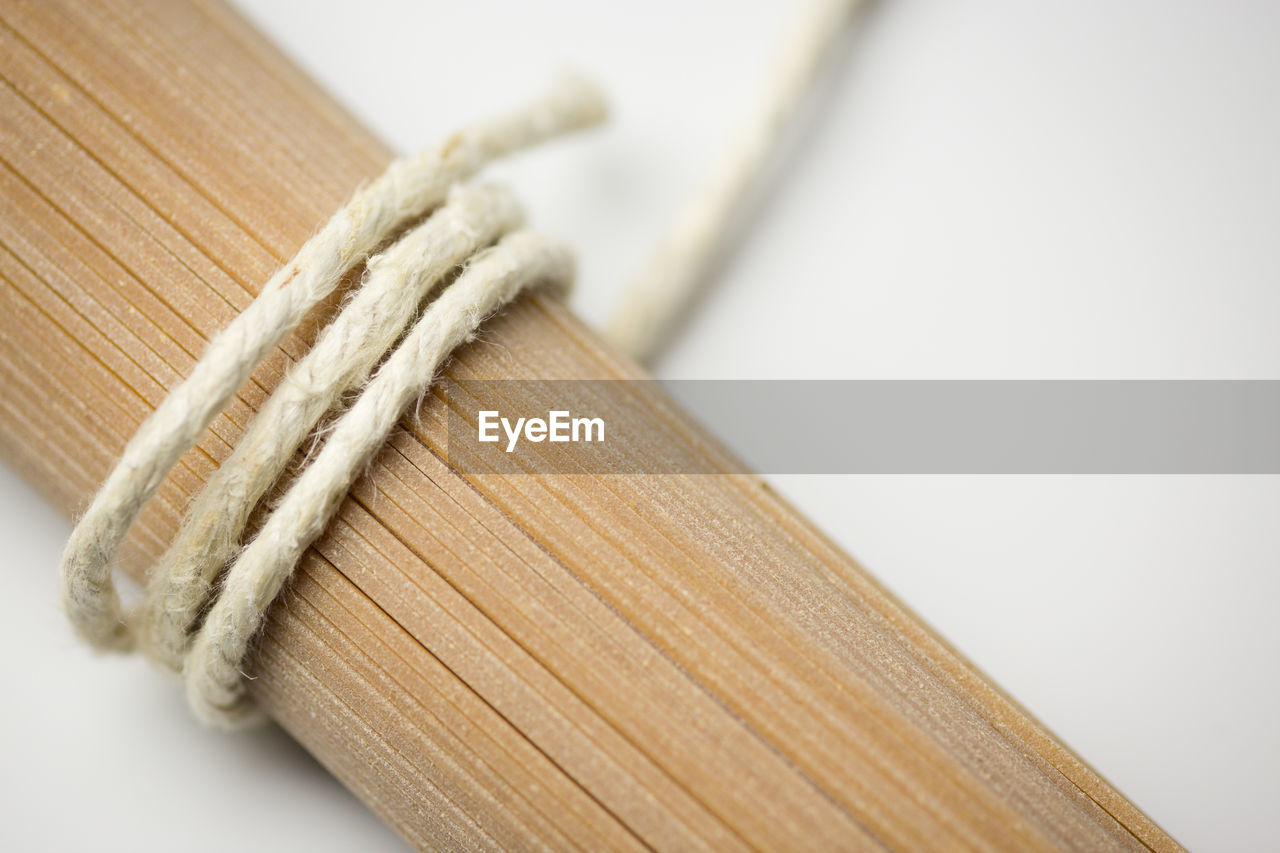 Close up of raw pasta over white background