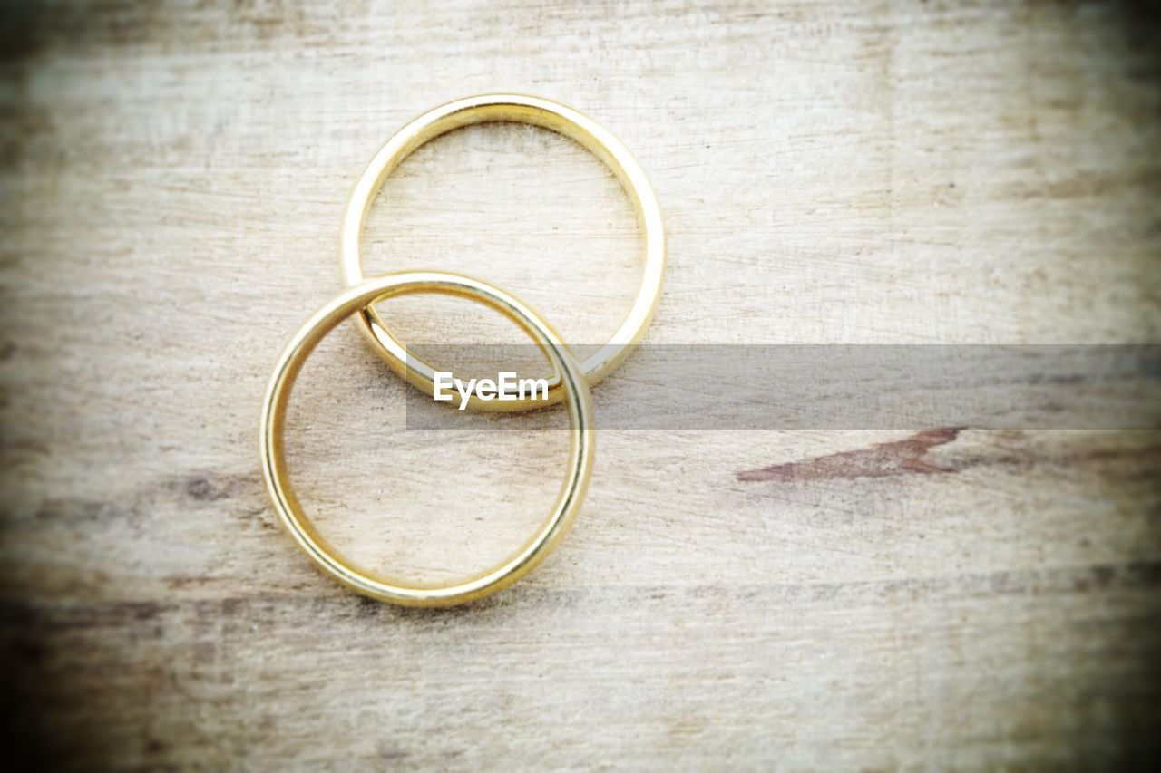 CLOSE-UP OF RING ON TABLE