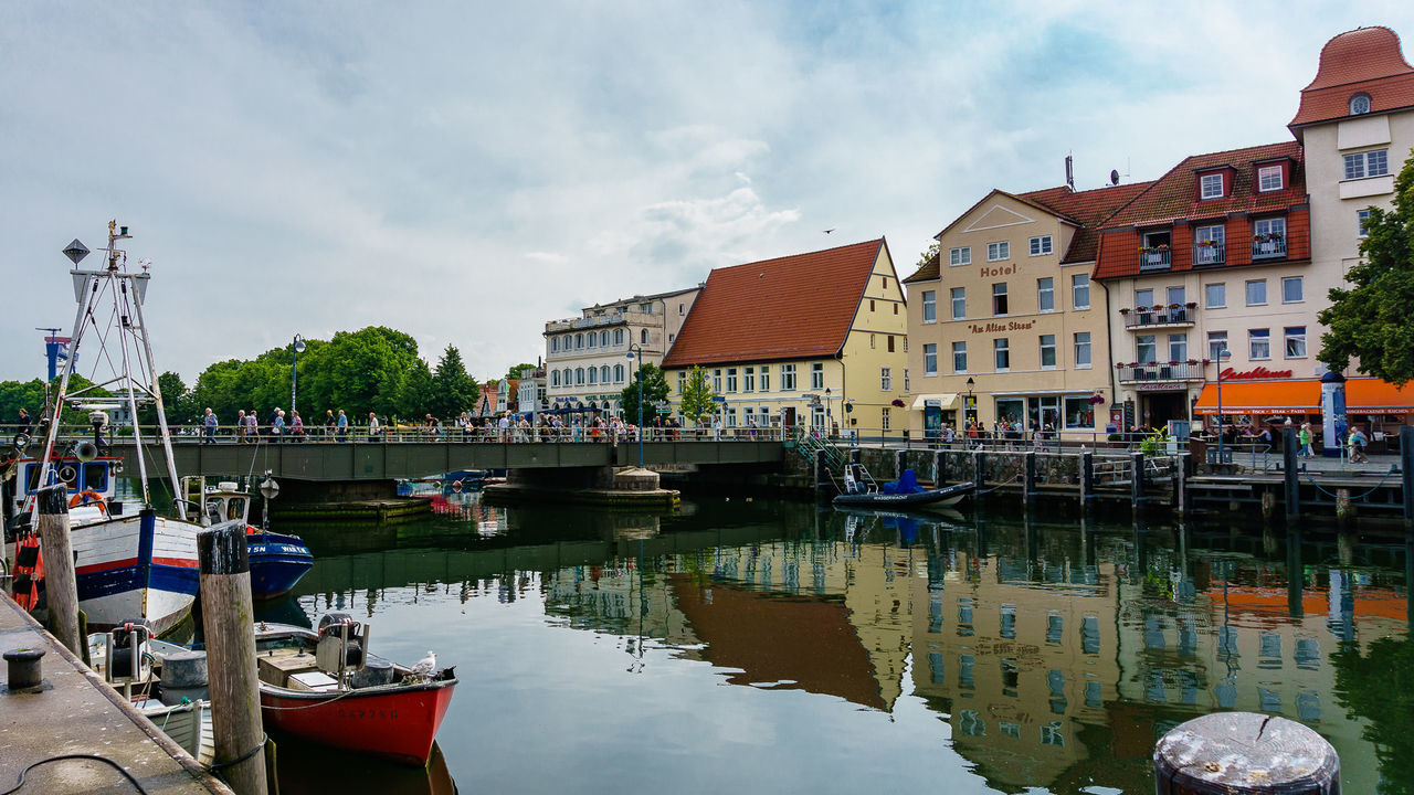 Scenic view of boats in canal