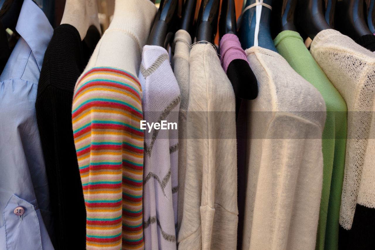 Close-up of multi colored clothing in store