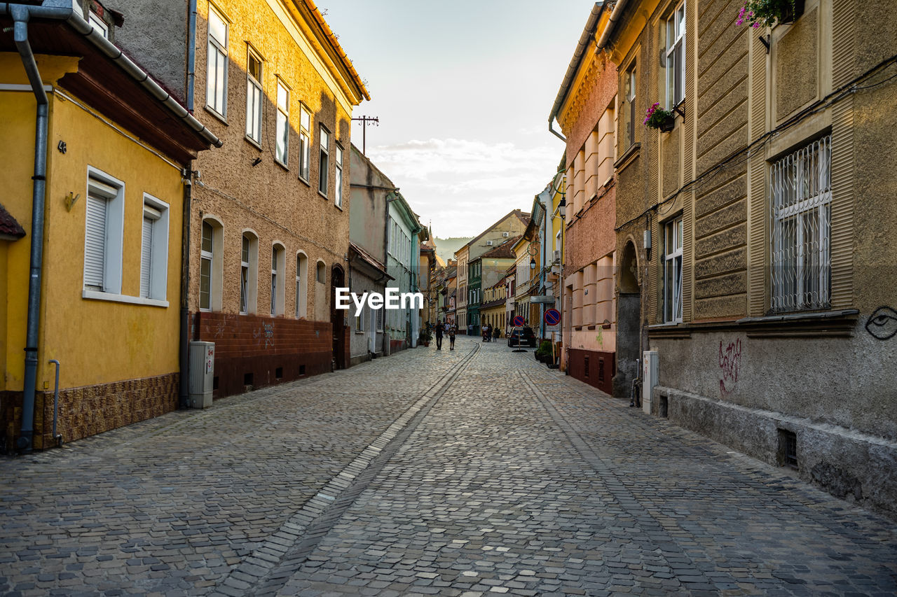 NARROW ALLEY ALONG BUILDINGS