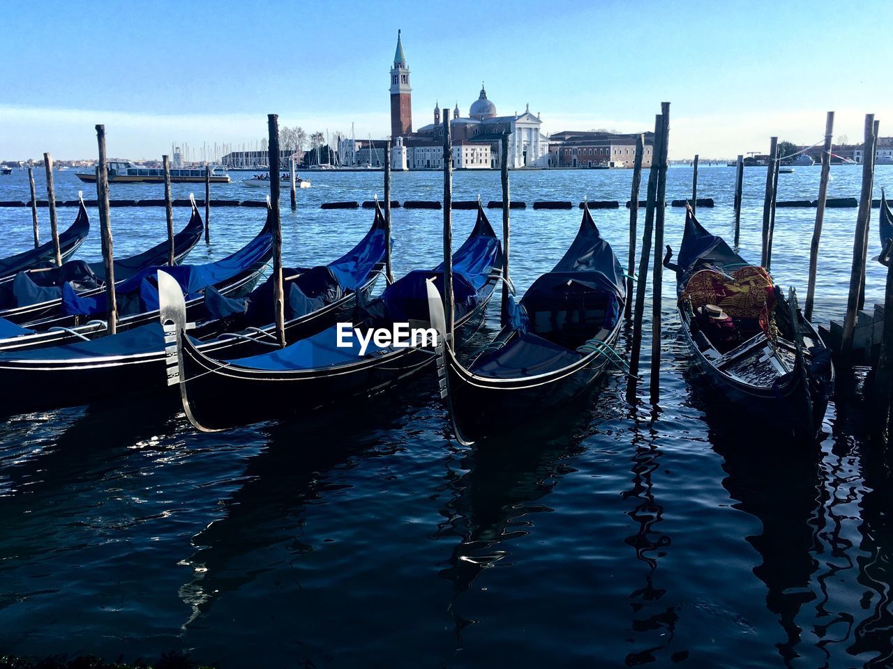 Gondolas moored in canal