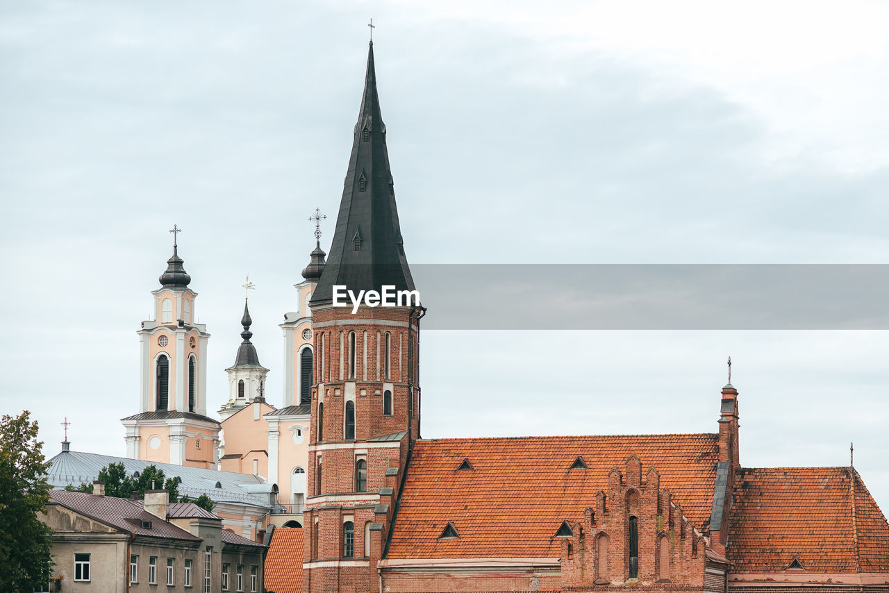 Low angle view of cathedral against cloudy sky