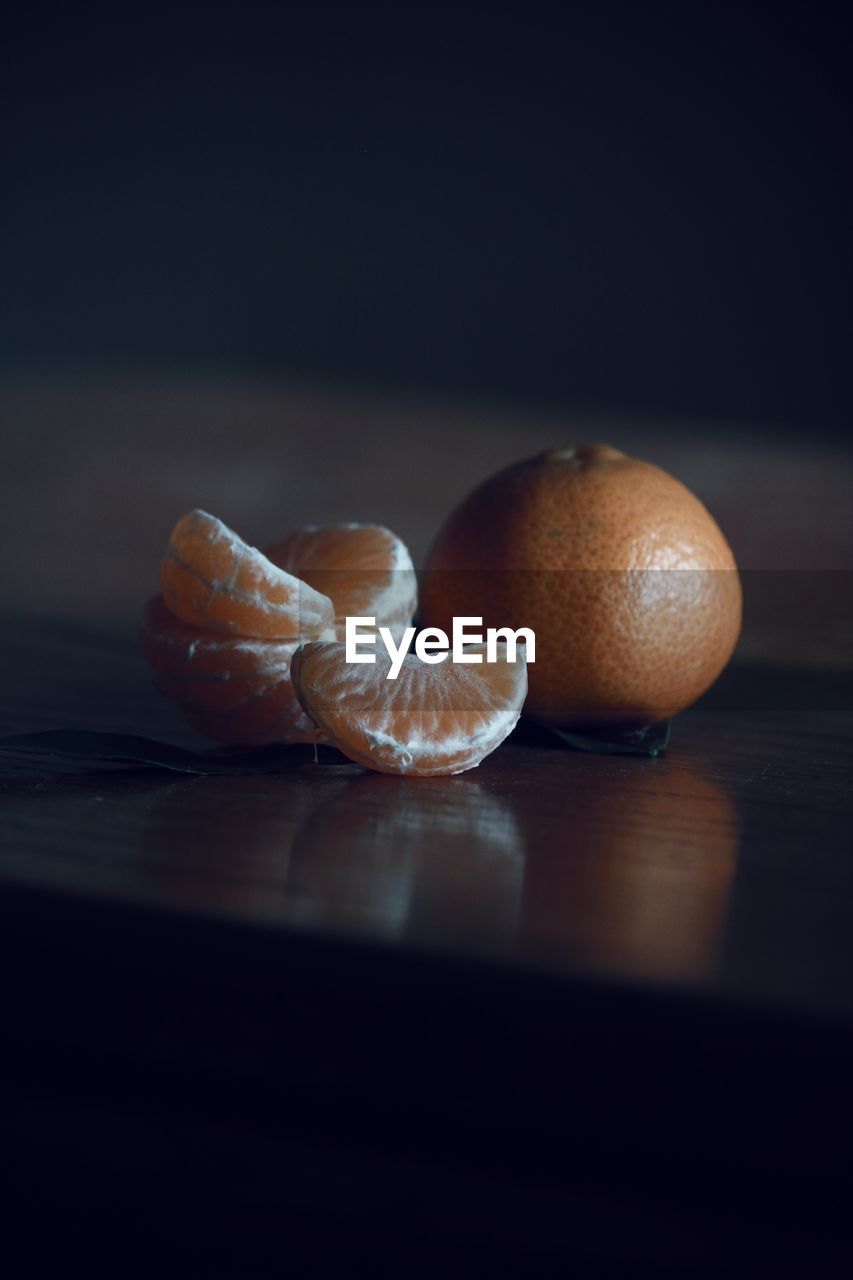 Close-up of oranges on table