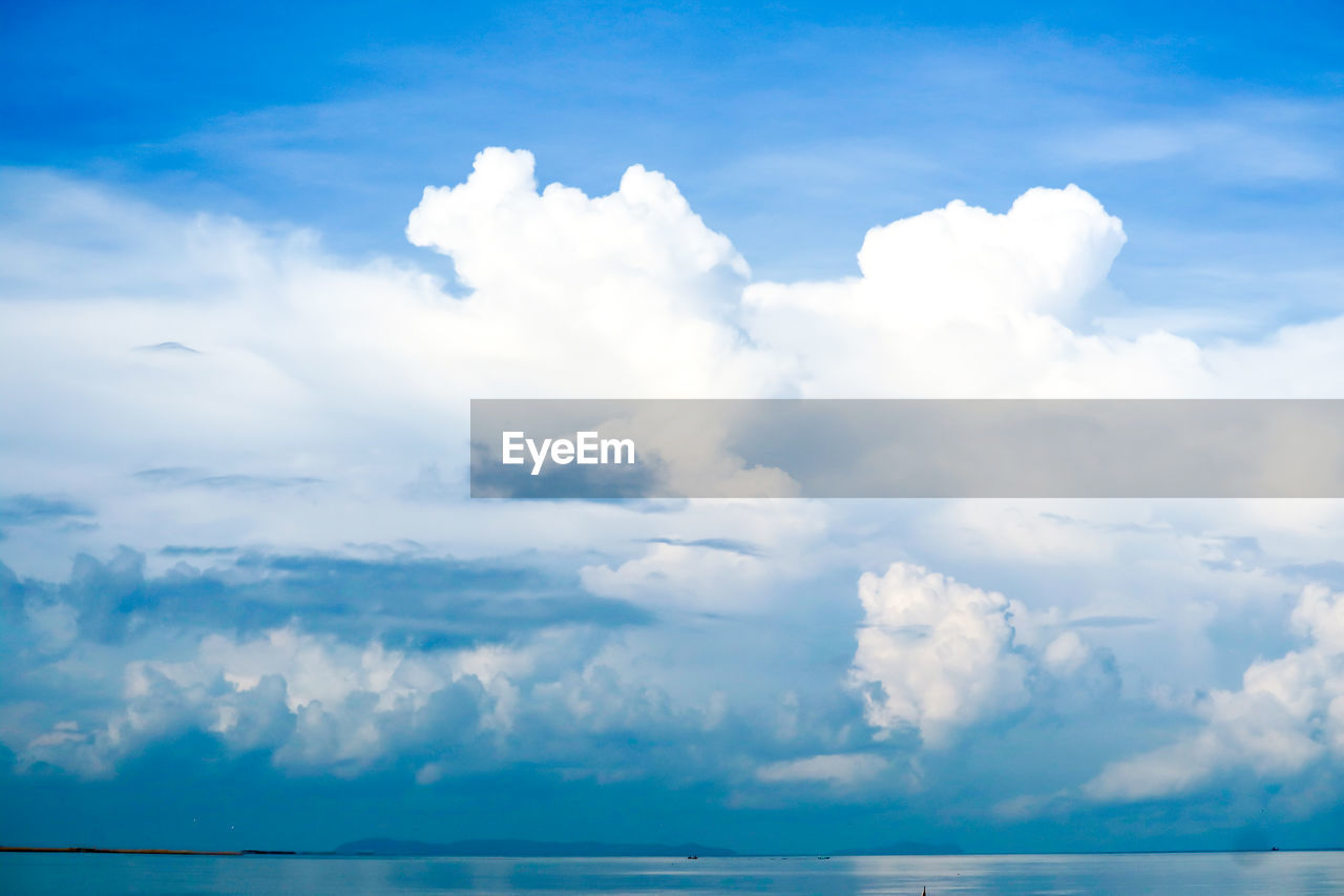 SCENIC VIEW OF CLOUDS OVER SEA