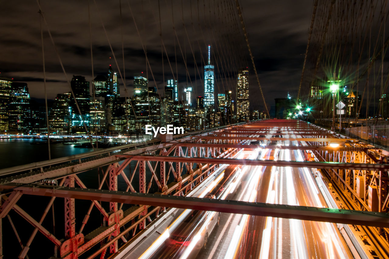 Light trails on bridge at night