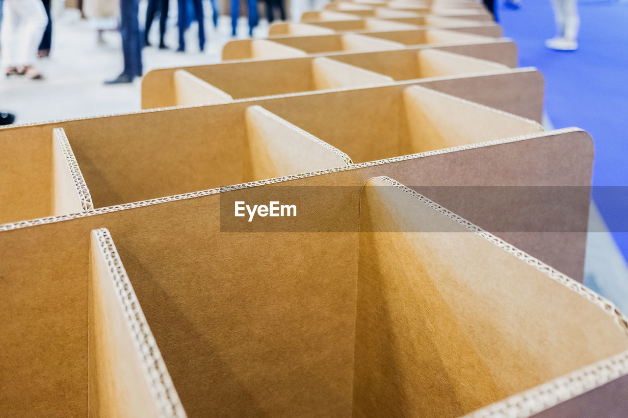 HIGH ANGLE VIEW OF PAPERS ON TABLE IN MARKET